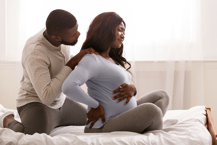 18 weeks pregnant women may experience backache