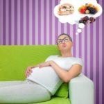 A pregnant lady thinking about the foods