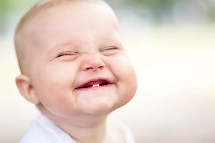 Cute smiling baby showing teeth picture