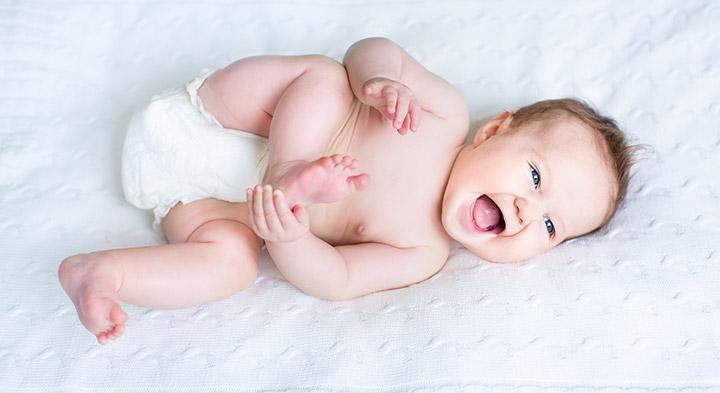 cute newborn baby boy smiling