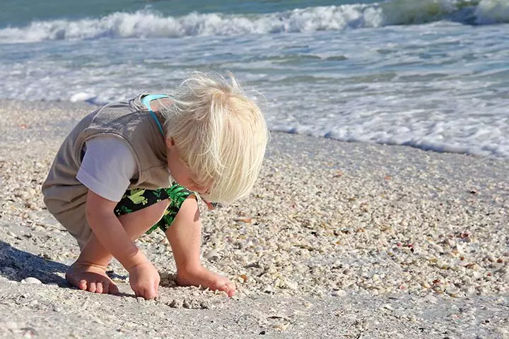 Collecting seashells and outdoor games for toddlers