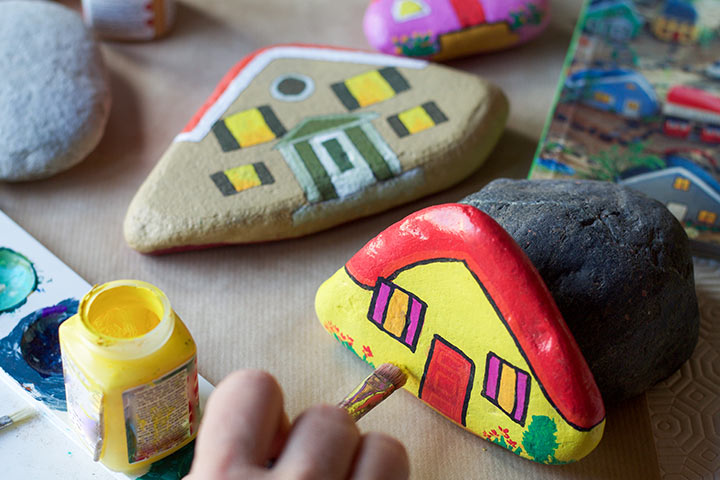Painting stones and outdoor games for toddlers
