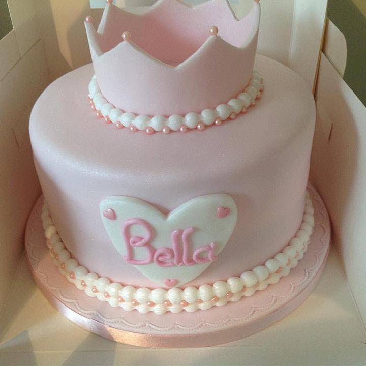 Birthday Cake For 1 Year The Cake Is Decorated With A Doll Figure And Decor  For The Girl Delicious Reception At A Birthday Party Trendy Cake On The  Background Of Balloons Stock