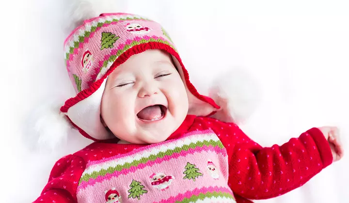 Cute baby in Christmas clothes smiling picture