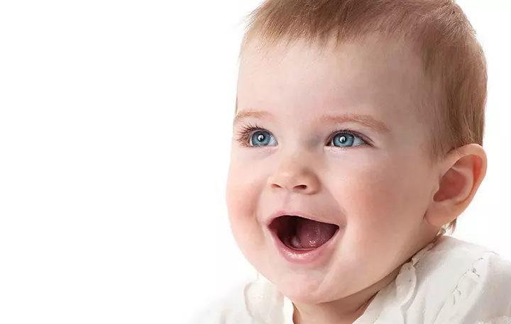 Beautiful baby girl with blue eyes smiling picture