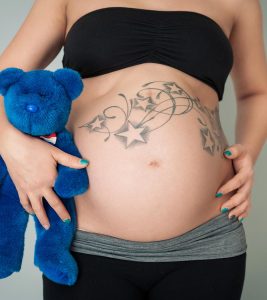 6 Risks & 3 Precautions While Getting A Tattoo During Pregnancy