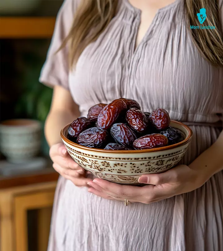 A person holds some dates