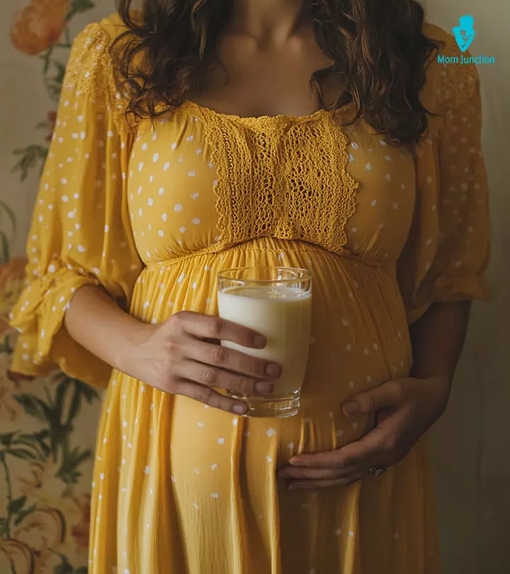 A-pregnant-lady-pouring-milk-into-a-glass