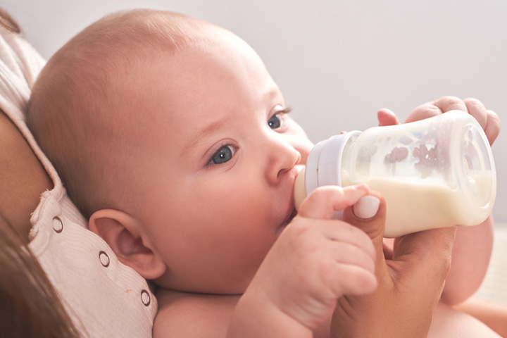 Babies may spit up curdled milk due to formula feeding.