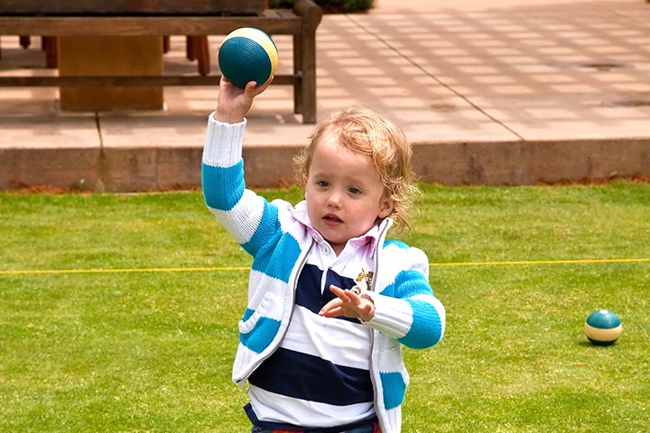 The ball meets the bucket activity for 18-month-old baby
