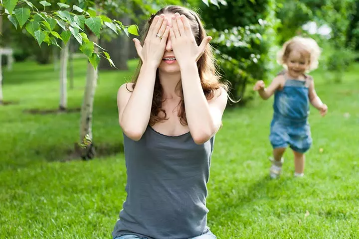 The classic hide and seek game for 18-month-old baby