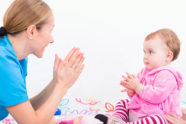 Dancing with a nursery rhyme activity for 6-month-old baby