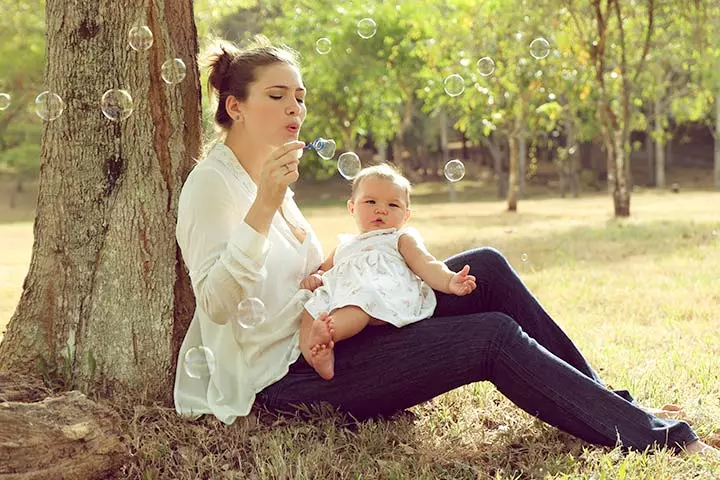 Playing with bubbles activity for 4-month-old baby