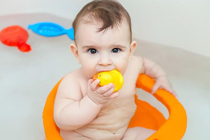 Siting and splashing the water activity for 6-month-old baby