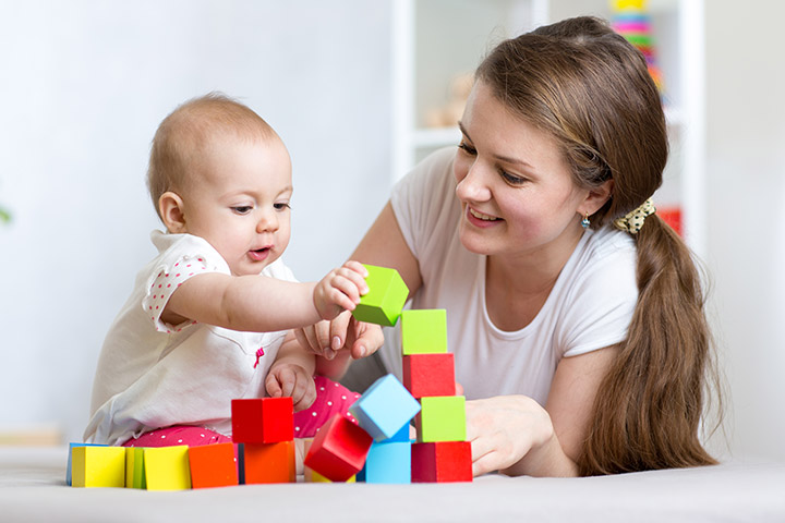 Stacking the blocks activity for 6-month-old baby