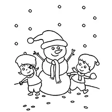 Printable kids playing with snowman coloring pages