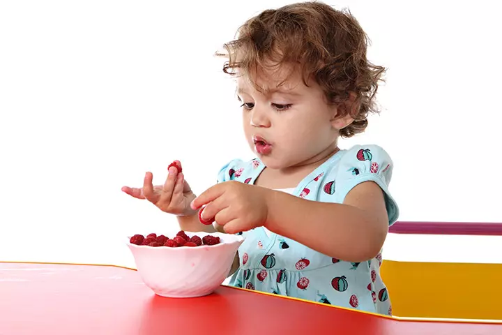 11 month old baby can use spoon as well as fingers for eating