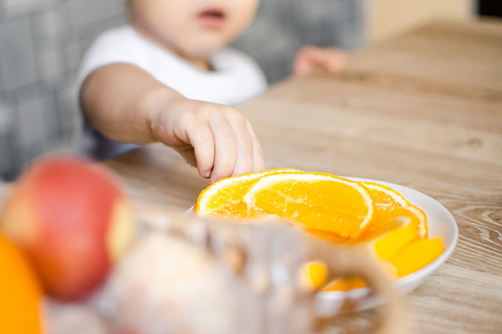 Citrus fruits may cause irritation to baby's swollen gums
