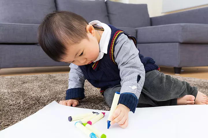 Draw with crayon activity to develop gross motor skills in children