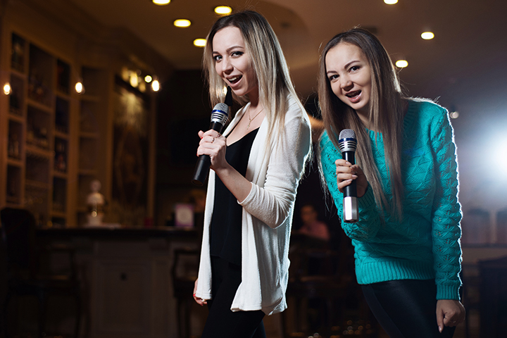 Enjoy a karaoke night with your daughter 