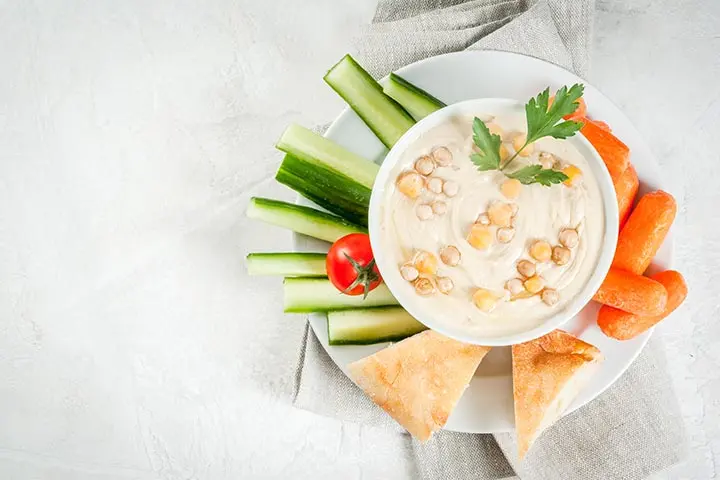 Hummus with boiled vegetables and chickpeas for bay