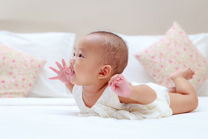Can thrust arms, One-month-old baby milestones