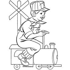 Little Boy Sitting On A Toy Train Coloring Page to Print