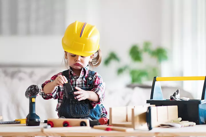 Toddler working on a project