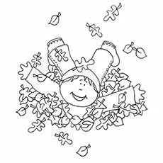 Hanna playing with leaves in the Fall coloring page
