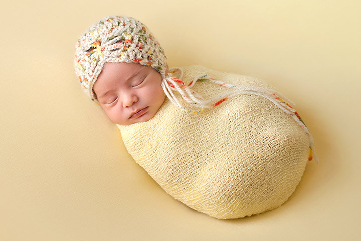 baby swaddled in blanket