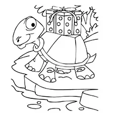 Turtle carrying Santa helper box coloring page