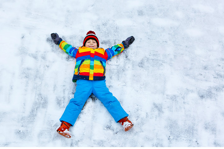 Making snow angels as a winter activity for kids
