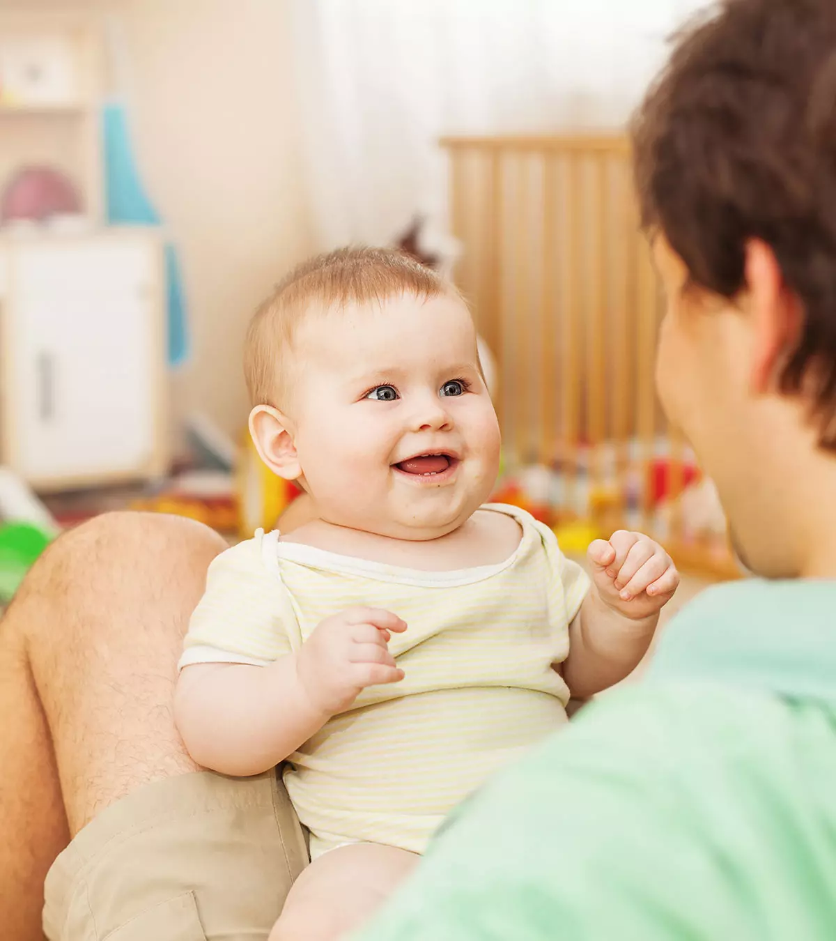 A Mom Teaching Baby Sign Language To Her Baby