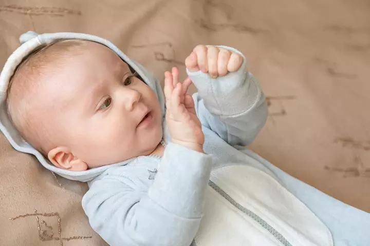 Babies start observing their hands and legs