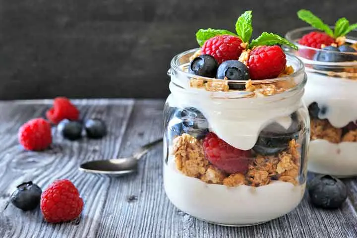 Greek yogurt parfait with granola and berries