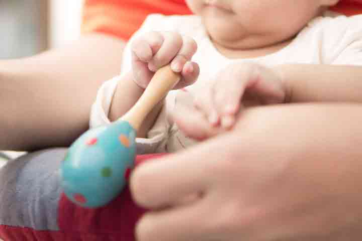 Pincer grasp develops between 9 to 12 months of age