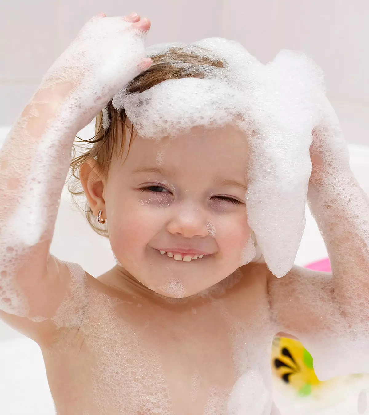 Toddler Getting A Hair Wash, Representing Hair Care Tips