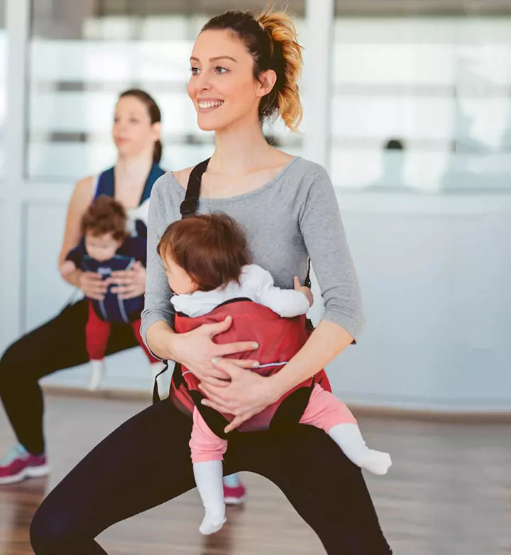 Carrier squat exercise with baby