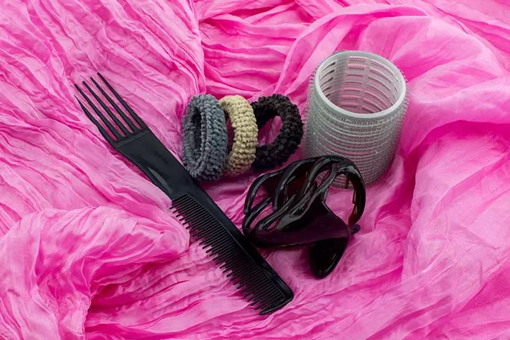 Comb and hairbands in new mom survival kit
