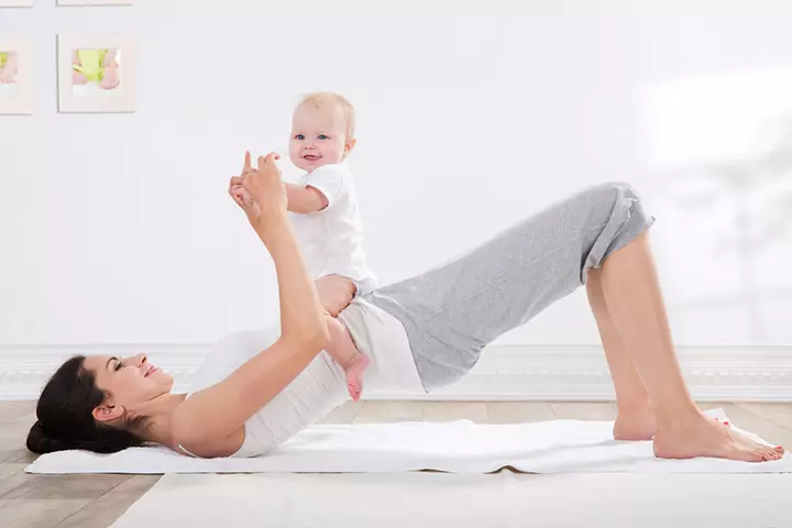 Glute lifts exercise with baby