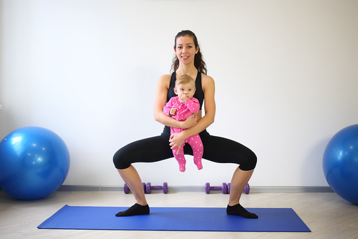Plie squat exercise with baby