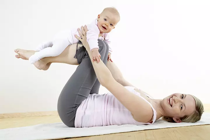 Reverse baby curl (A) exercise with baby