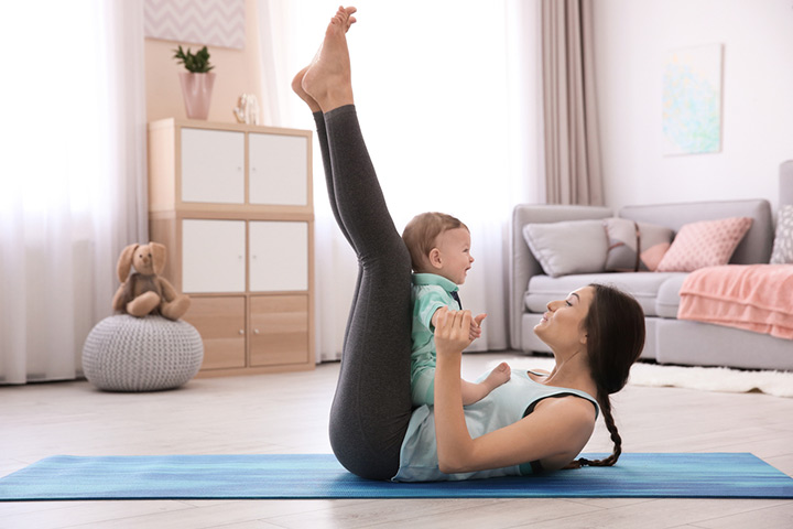 Butterfly stretching exercise with baby