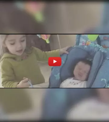Little Girl Is Worried About Her Newborn Sister