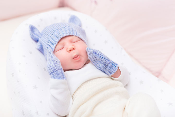 Mitten covered hands can prevent babies from rubbing their eyes