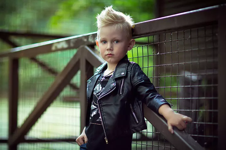 Child with punk-inspired mohawk haircut.