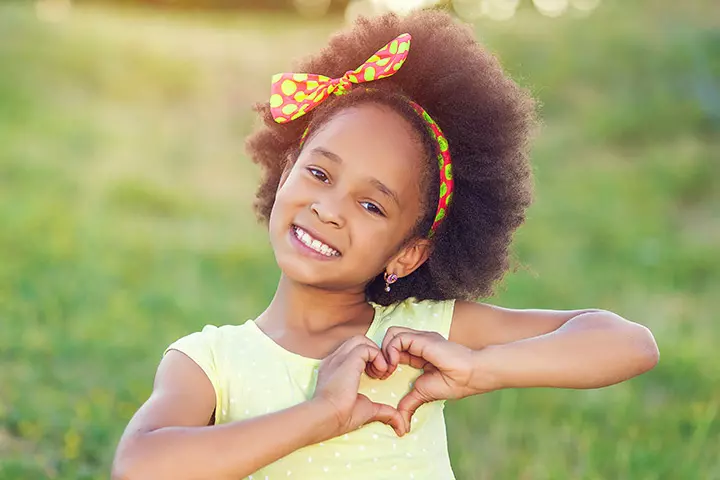 Afro frizzy hair with bow ribbon, short hairstyle for kids