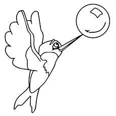 Coloring page of a hummingbird playing with a bubble
