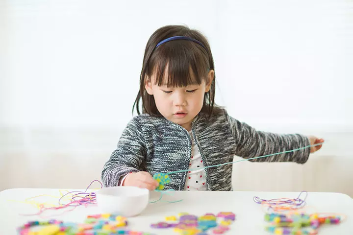 Paper beads, an indoor game for kids