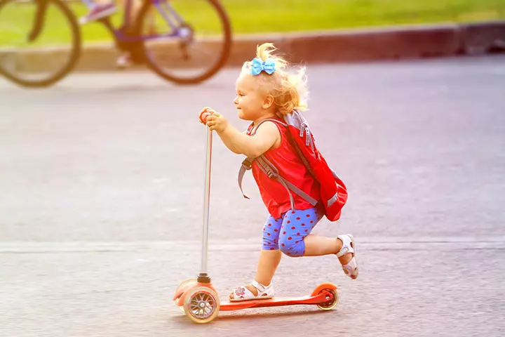 Backpacking On Her Scooter